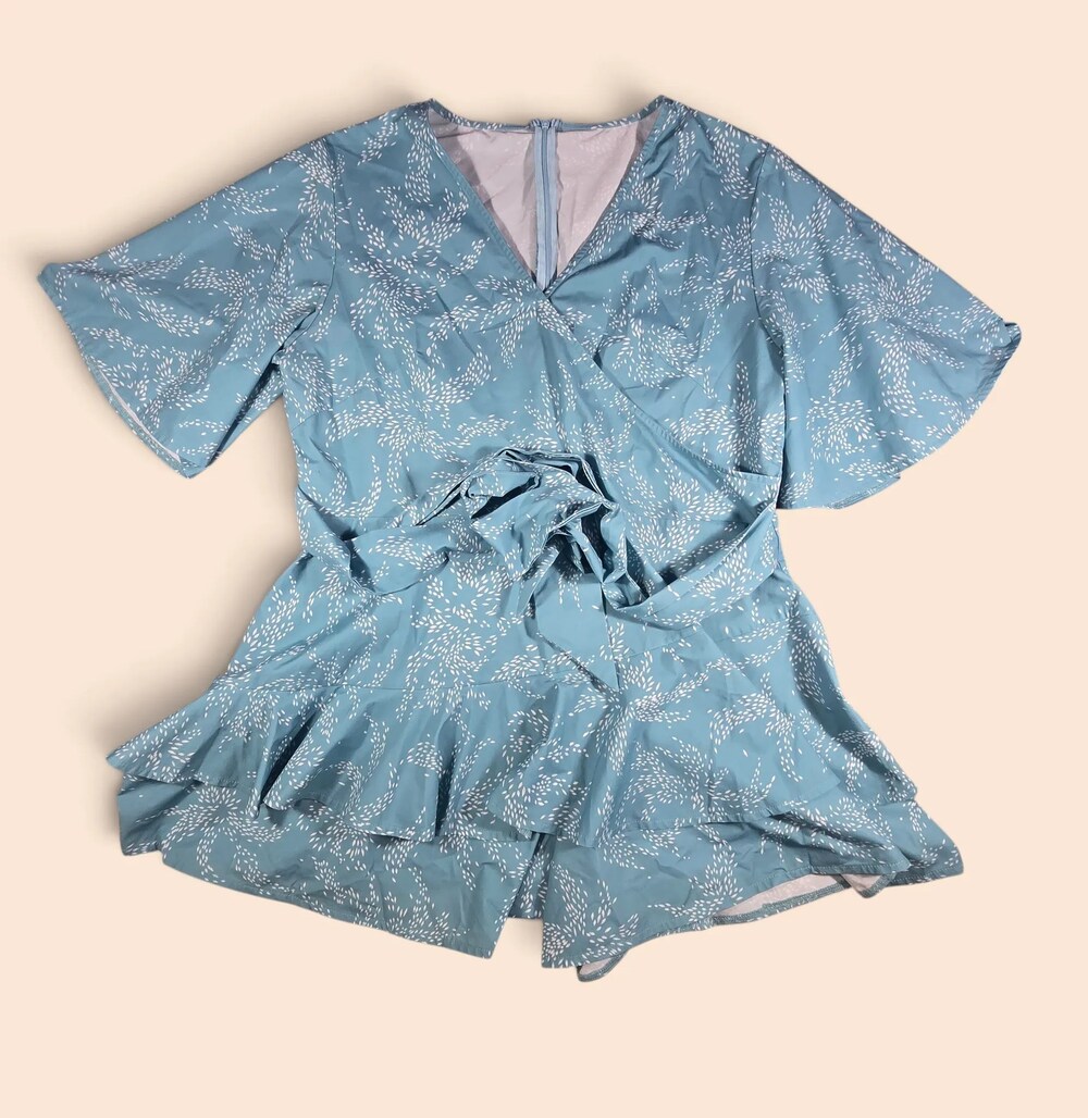 Dusty Blue Speckled Print Wrap V-Neck Romper with Layered Ruffle Hem & Tie Waist